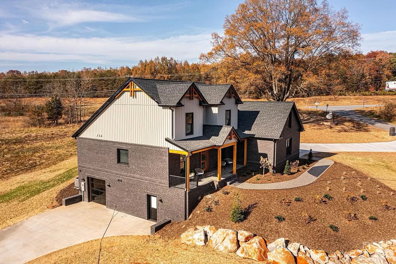 Aerial view of a completed Southern Valley Properties home and surrounding site work